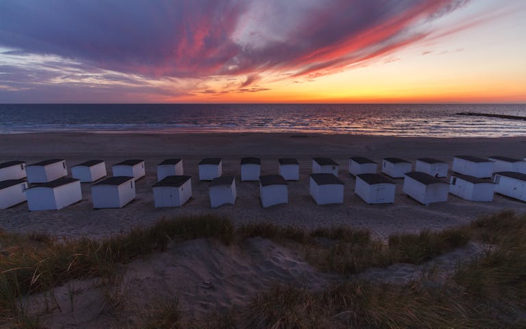 Badehytter på stranden i Løkken, Danmark -
Foto: Getty Images