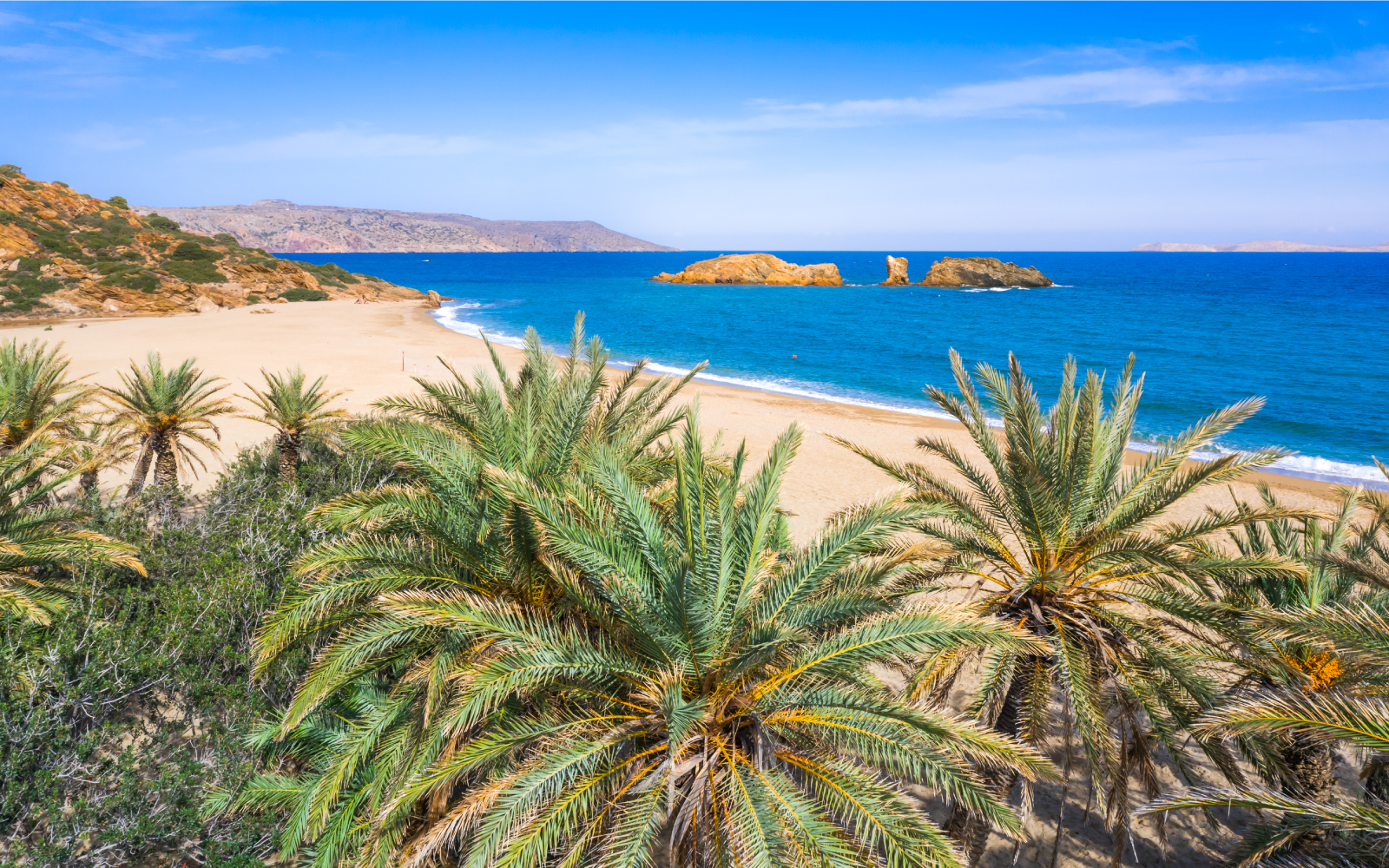 Vái Beach. Her finner du øyas eneste, naturlige palmestrand, skal vi tro ryktene. - Foto: Getty Images