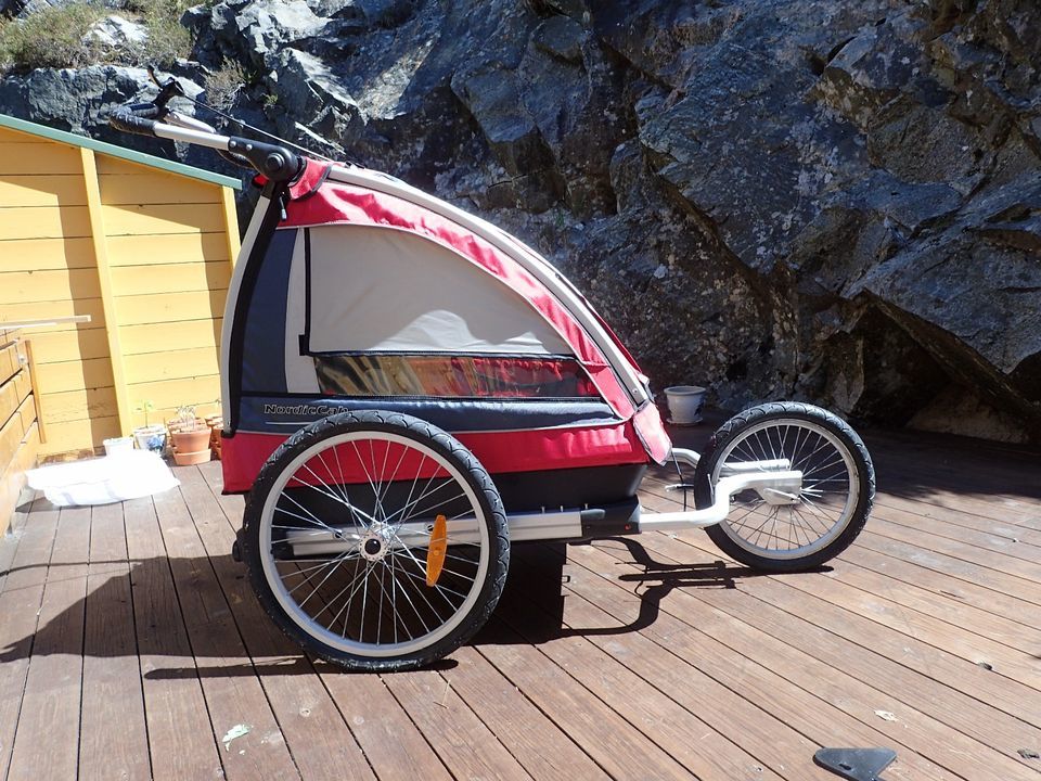 Barnevogn på terrasse